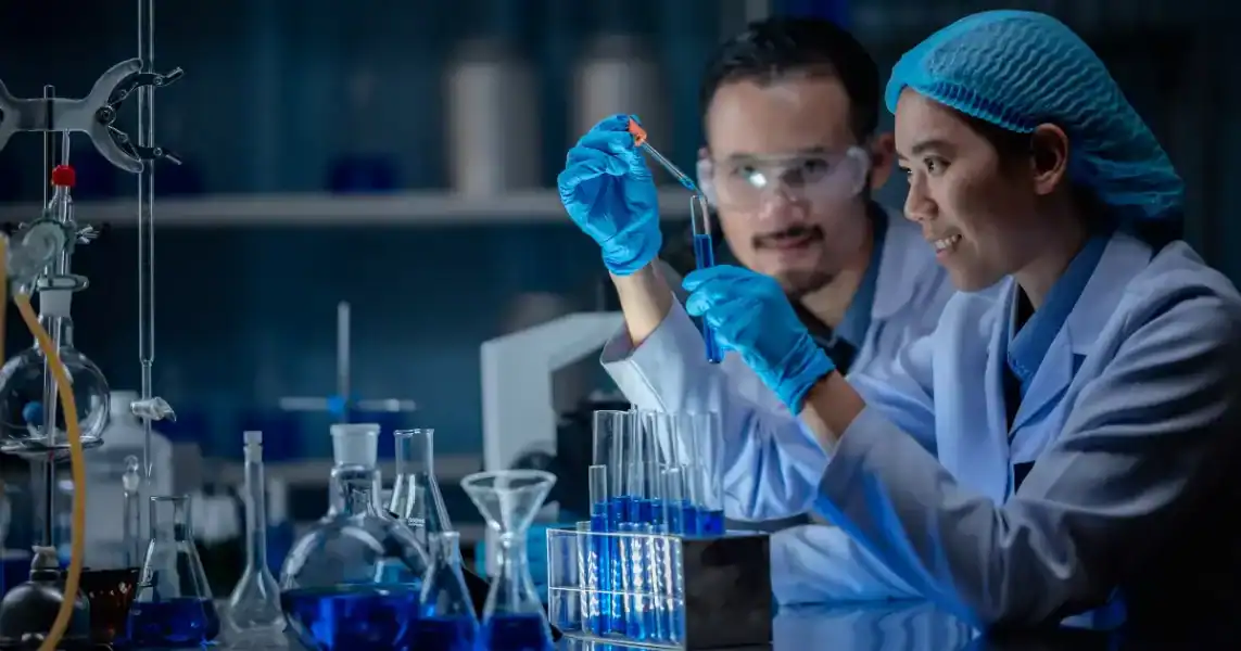 Researchers conducting advanced medical technology experiments in a laboratory setting, focusing on clinical research and innovative solutions for healthcare.