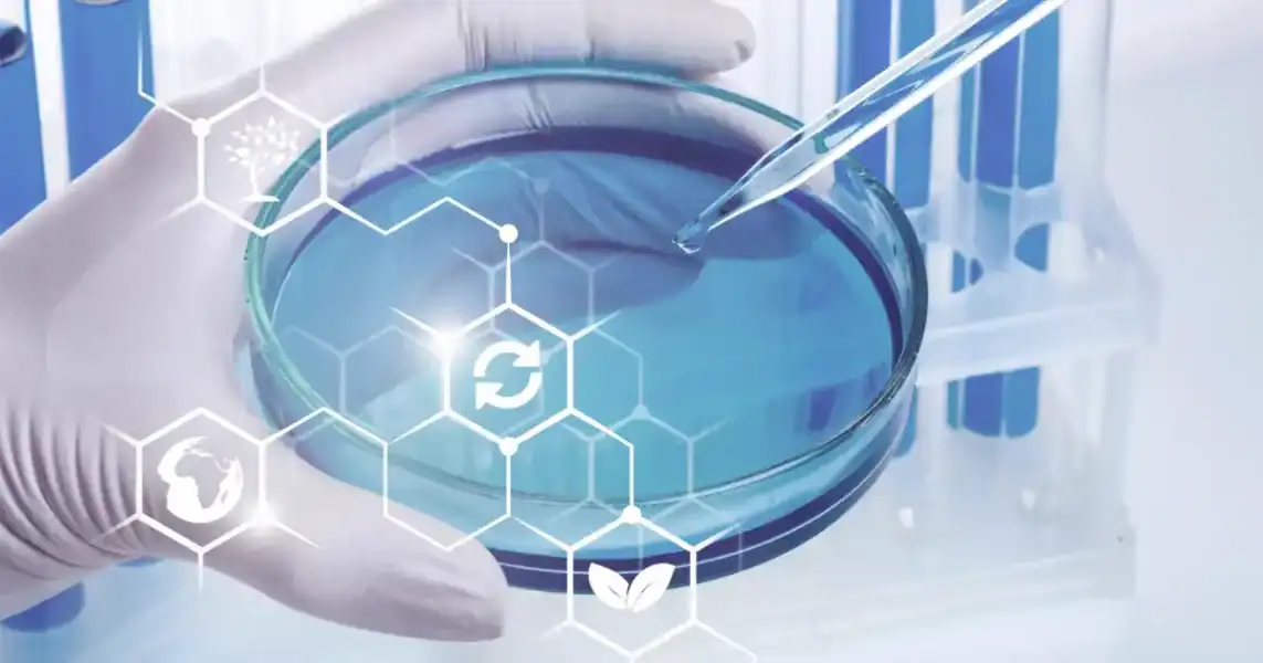 This image showcases IVD laboratory techniques and biotechnology innovation. There is hand whit a white glove handling medical devices.