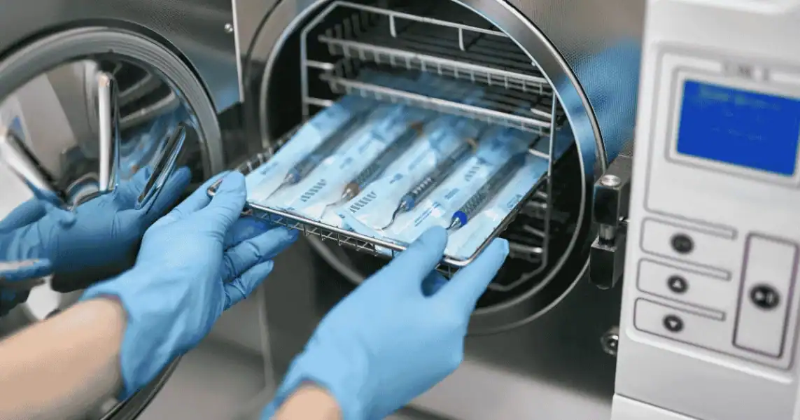 Sterile medical syringes being sterilized in an industrial autoclave for advanced MedTech applications.